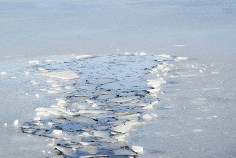 Daring Rescue on Lake Koshkonong, Fort Atkinson Fire Department Saves Snowmobiler from Icy Waters