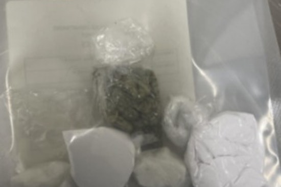 Minneapolis Traffic Stop Leads to Discovery of Guns and Drugs, Convicted Felon Charged