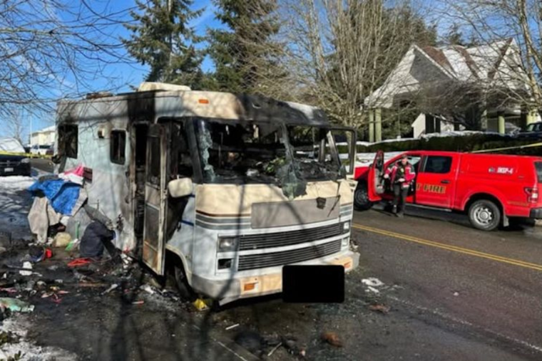 One Dead, Another Critically Injured in Everett RV Fire; Investigation Underway