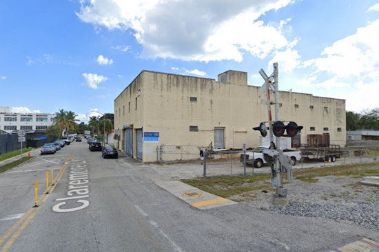 West Palm Beach Non-Profit 'Jack the Bike Man' Warehouse Engulfed in Significant Fire, Disrupts Local Traffic and Train Services