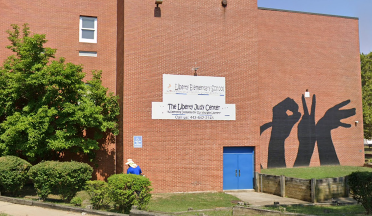 Baltimore Teacher with Gun Conviction Accused of Shooting Police Officer: School's Hiring Decisions Under Fire