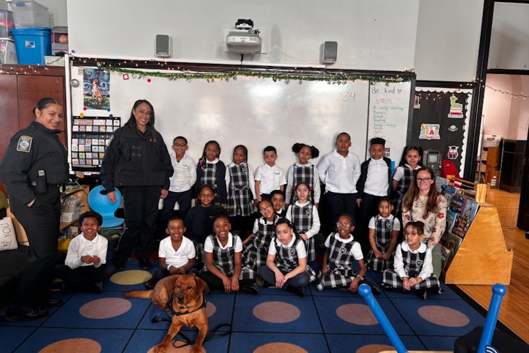 Boston Police Officers and Comfort Dog Copper Engage with Students at Saint John Paul II School