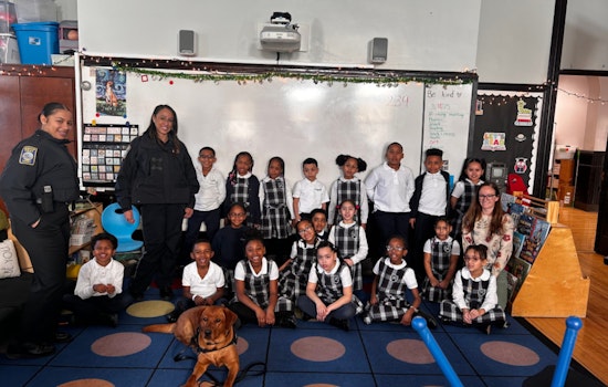 Boston Police Officers and Comfort Dog Copper Engage with Students at Saint John Paul II School