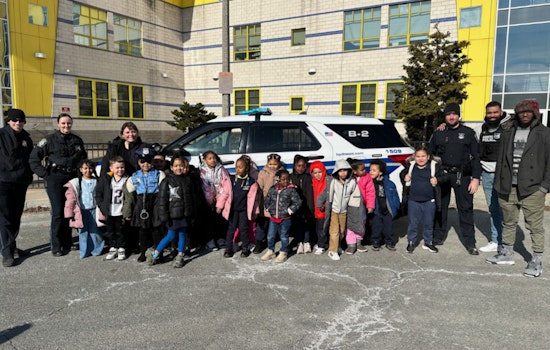 Boston Police Officers Engage with Students at Orchard Gardens School Career Day to Foster Community Trust