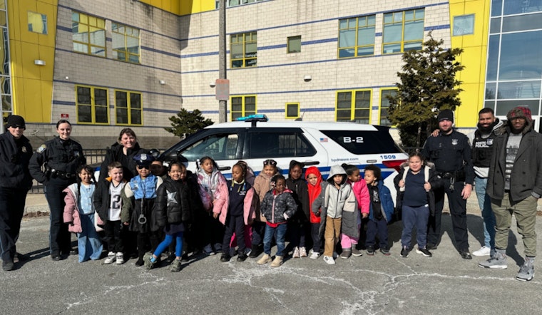 Boston Police Officers Engage with Students at Orchard Gardens School Career Day to Foster Community Trust