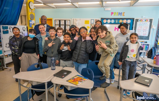 Boston Police Officers Engage with Youth at Blackstone School Literacy Event