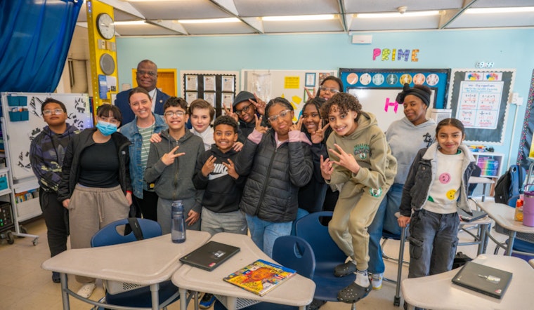 Boston Police Officers Engage with Youth at Blackstone School Literacy Event