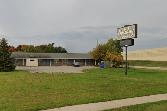 Kalamazoo Man Seriously Injured in Hatchet Attack at Portage Motel, Investigation Underway