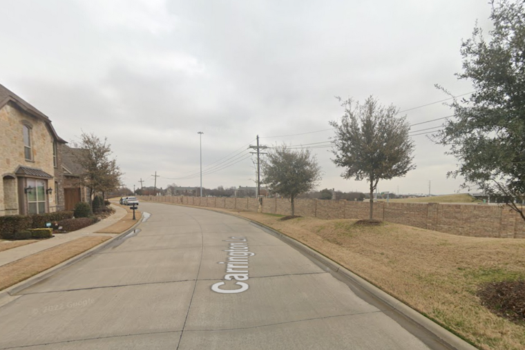 Lewisville Neighborhood Plunged into Darkness as Power Pole Falls, Causing Outage and Grass Fire