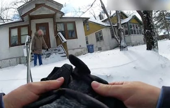 Minneapolis Police Officer's Act of Kindness Helps Elderly Resident with Snow Shoveling Duties