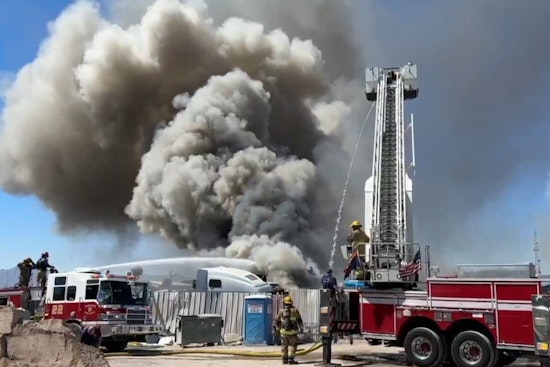 Phoenix Firefighters Tame Blaze at Central City Scrapyard, Probe Underway to Uncover Cause