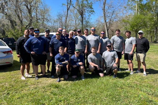 St. Bernard Fire Department Triumphs Over Sheriff's Office in Friendly Tug-of-War at Islenos Fiesta