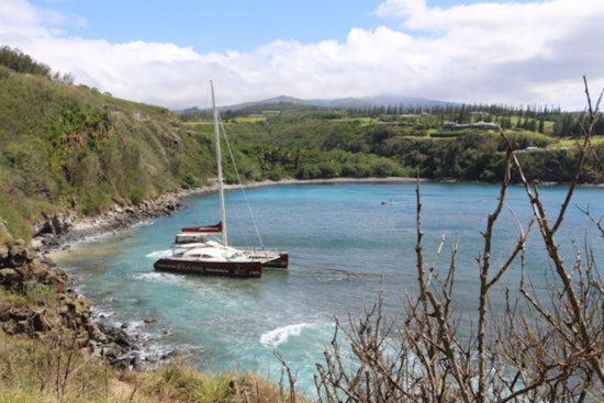 Stranded 'Hula Girl' Catamaran Successfully Removed from Honolua Bay After Extended Salvage Effort