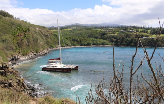 Stranded 'Hula Girl' Catamaran Successfully Removed from Honolua Bay After Extended Salvage Effort