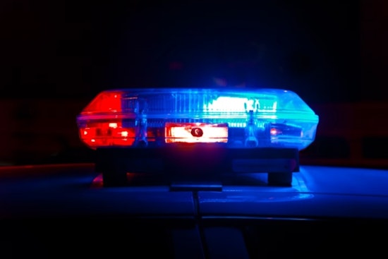 Vehicle Plunges into Canal in Sunrise One Person Detained as Authorities Investigate