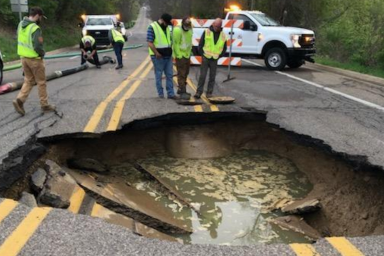 Battle Creek's Riverside Drive Closes due to Sinkhole Amid Sewer Repairs, Detours in Place