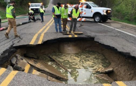 Battle Creek's Riverside Drive Closes due to Sinkhole Amid Sewer Repairs, Detours in Place