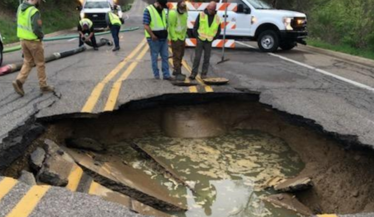 Battle Creek's Riverside Drive Closes due to Sinkhole Amid Sewer Repairs, Detours in Place