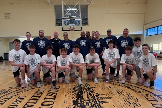 Boston Police and Local Youth Forge Bonds Over Friendly Basketball Match at Roche Community Center