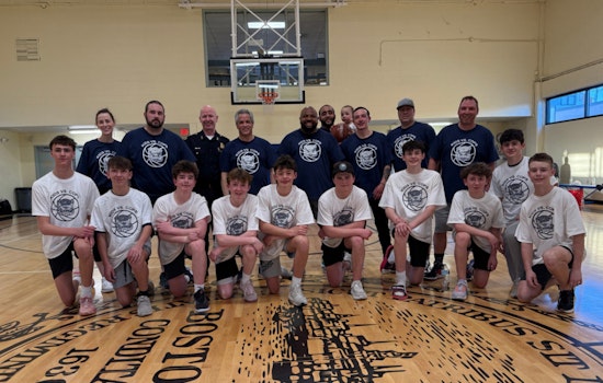 Boston Police and Local Youth Forge Bonds Over Friendly Basketball Match at Roche Community Center