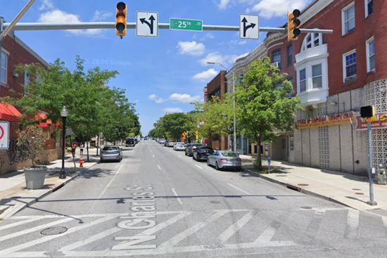Driver Running Red Light Causes Johns Hopkins Shuttle to Crash into Building in Baltimore