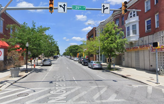 Driver Running Red Light Causes Johns Hopkins Shuttle to Crash into Building in Baltimore