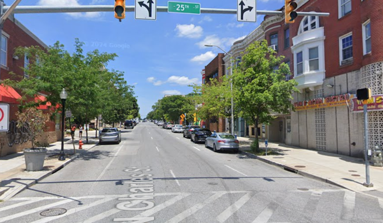Driver Running Red Light Causes Johns Hopkins Shuttle to Crash into Building in Baltimore