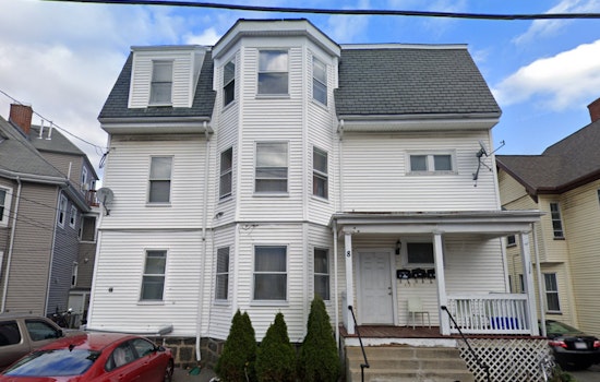 Firefighters Battle Intense Blaze at Malden Triple-Decker, Leaving Two Injured and Families Displaced