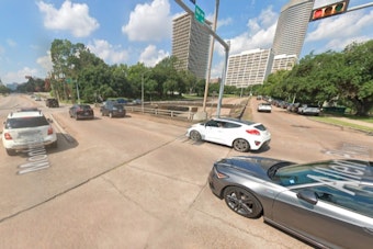 Houston Emergency Crews Respond to Vehicle Dangling Over Allen Parkway Overpass Following Montrose Area Crash