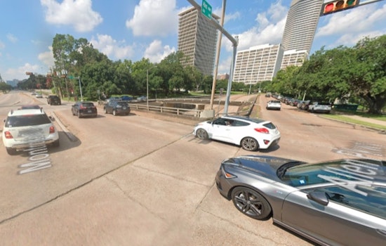 Houston Emergency Crews Respond to Vehicle Dangling Over Allen Parkway Overpass Following Montrose Area Crash