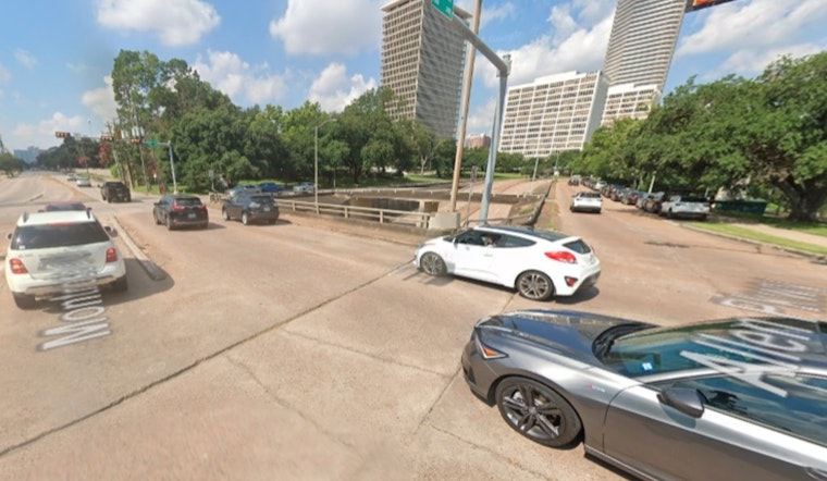 Houston Emergency Crews Respond to Vehicle Dangling Over Allen Parkway Overpass Following Montrose Area Crash