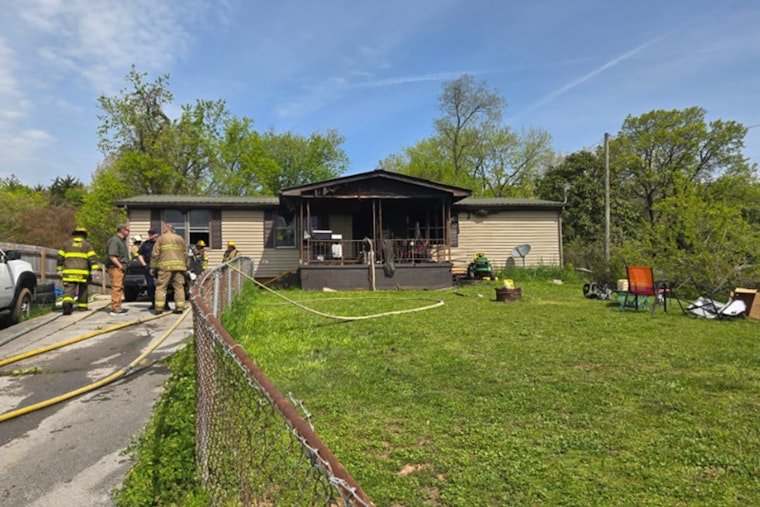 Knoxville Community Mourns Tragic Loss as Fire Engulfs Home, Ten Dogs Perish Despite Rural Metro Fire's Brave Efforts