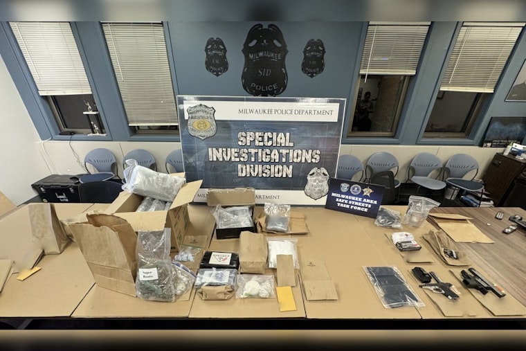 Milwaukee Police Seize Large Drug Cache and Firearms, Arrest Probation Violator in Major Operation