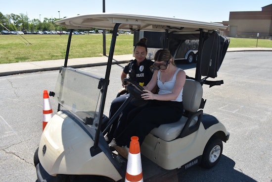 Monroe Police Engage Teens in Drunk Goggle Simulation to Combat Impaired Driving Risks