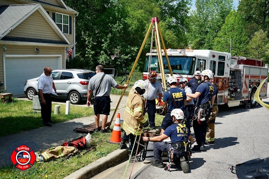 Raleigh Firefighters and Animal Control Reunite Dog with Owner Following Storm Drain Rescue on Laurel Glen Drive