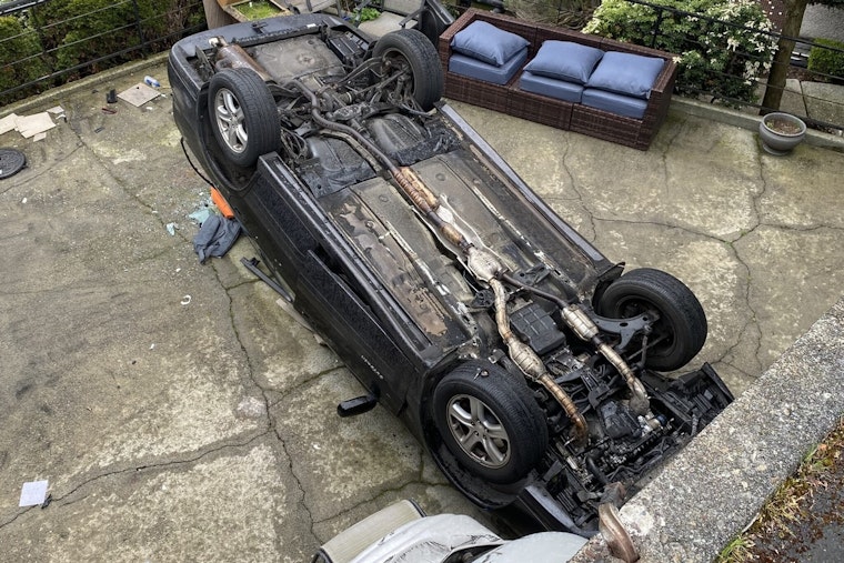 Senior Citizen Injured as Car Plunges onto Queen Anne Apartment Patio in Seattle