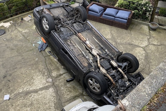Senior Citizen Injured as Car Plunges onto Queen Anne Apartment Patio in Seattle