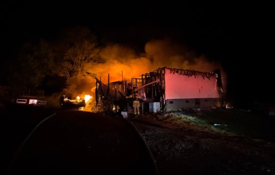 South Knox County Family Escapes Unharmed as Home Erupts in Flames Amidst Explosions from Stored Ammunition