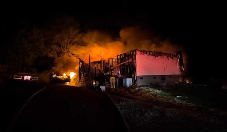 South Knox County Family Escapes Unharmed as Home Erupts in Flames Amidst Explosions from Stored Ammunition