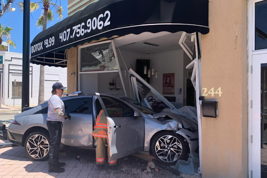 Two Injured as Car Crashes into Daytona Beach Business Following Red Light Collision