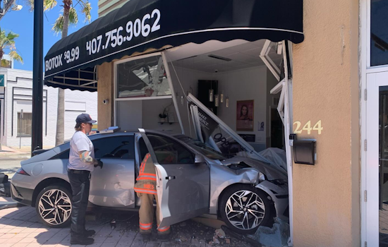 Two Injured as Car Crashes into Daytona Beach Business Following Red Light Collision