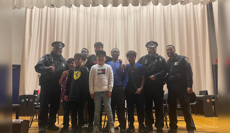 Boston Police Officers Join JFK Elementary's Rite of Passage, Celebrating Student Milestones and Community Bonds