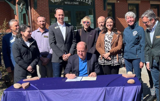 Colorado Governor Polis Signs Bipartisan Winter Road Safety Bill with Chain-Assist Program for Drivers in Vail and Beyond