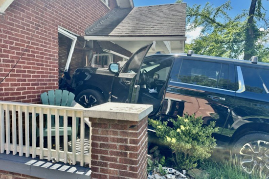 Driver's 'Boot-Stuck' Accident Leads to Pedestrian Injury and Home Damage in East Knoxville