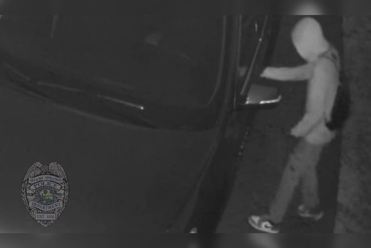 Miami Springs on Alert as Suspect in "Car Hopping" Spree Eludes Police, Loaded Gun Stolen
