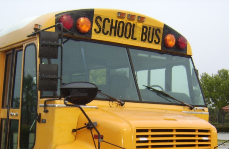 Multi-Hospitalization Incident as School Bus Collides with SUV on Chicago's South Side; Authorities Cite SUV Driver