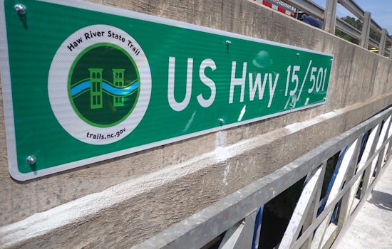 New Signage Over Haw River Bridges Aids Paddlers and Enhances Emergency Response