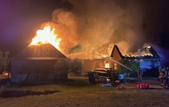 Oklahoma City Firefighters Extinguish Northeast House Fire, Rescue Two Dogs Amidst Potential Lightning Strike Incident