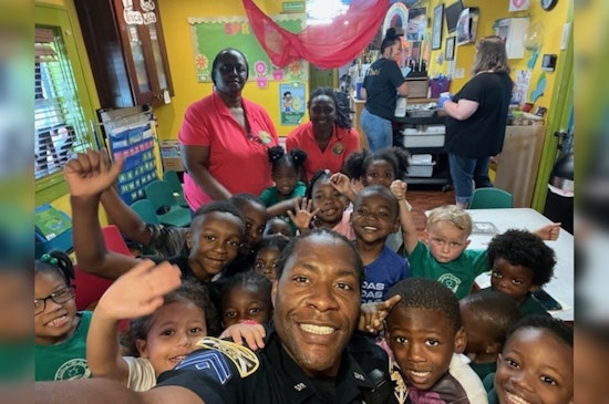 St. Petersburg Officer "Friendly" Brings Joy to Preschool Graduates with Reading Session and Gifts