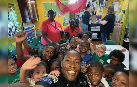 St. Petersburg Officer "Friendly" Brings Joy to Preschool Graduates with Reading Session and Gifts
